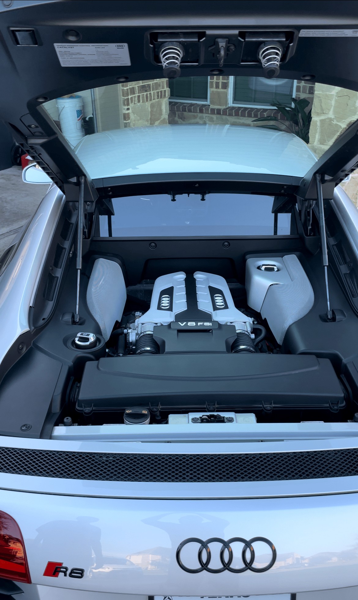 Spotless Audi R8 V8 engine bay after a full detail